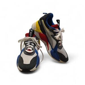 Puma RS-X Toys sneakers with a white, blue, and red colorway Women's 9.5 Men's 8